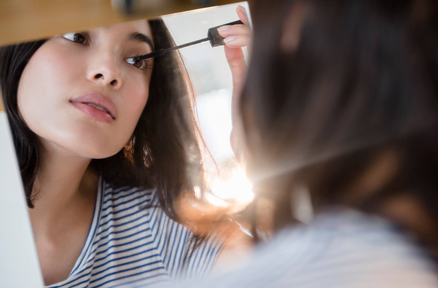 GettyImages-woman-mascara-eyebrows