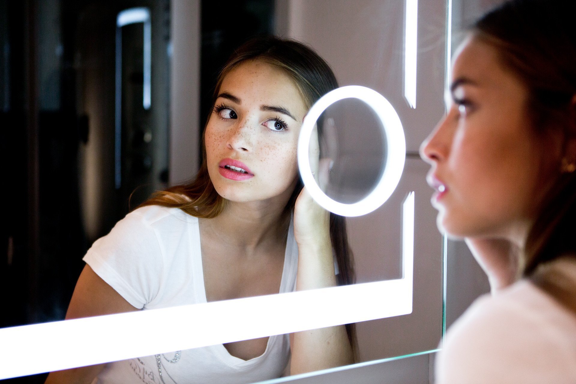 checking eyebrows
