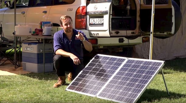 man talking about foldable solar panels