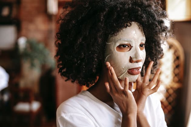 curly hair girl with face mask