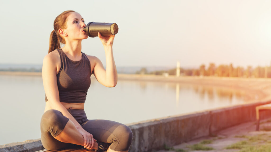 woman drinking protein for weight loss
