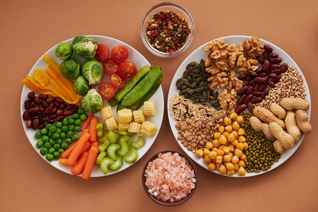 picture of two plates with food on a brown background