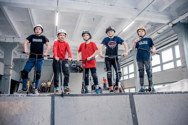 boys with stunt scooters