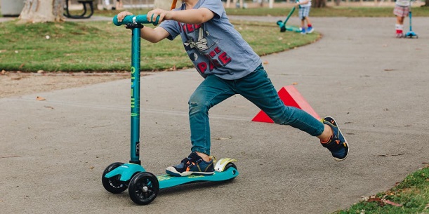kid on scooter